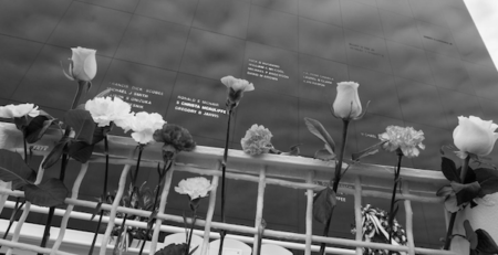 Floral tributes at the Space Mirror memorial. Credit: NASA/Kim Shiflett, from the Day of Remembrance page.