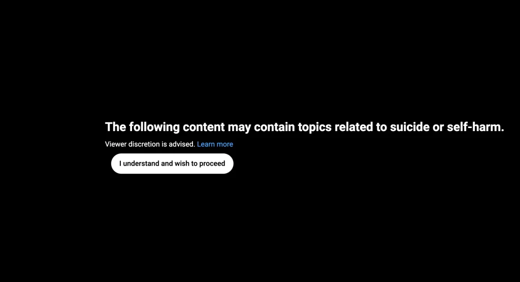 A screen from YouTube flagging up a 9/11 video as "suicide or self harm" content